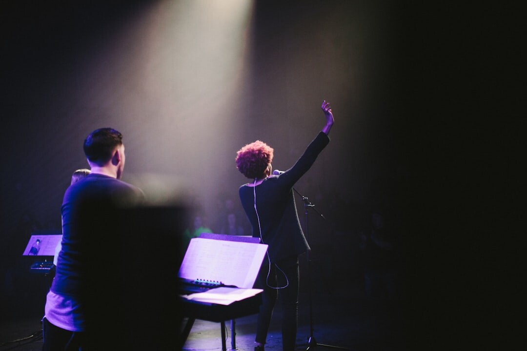 singers performing duet on stage